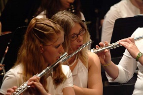 Students participating in the DHS Band Program playing Flute